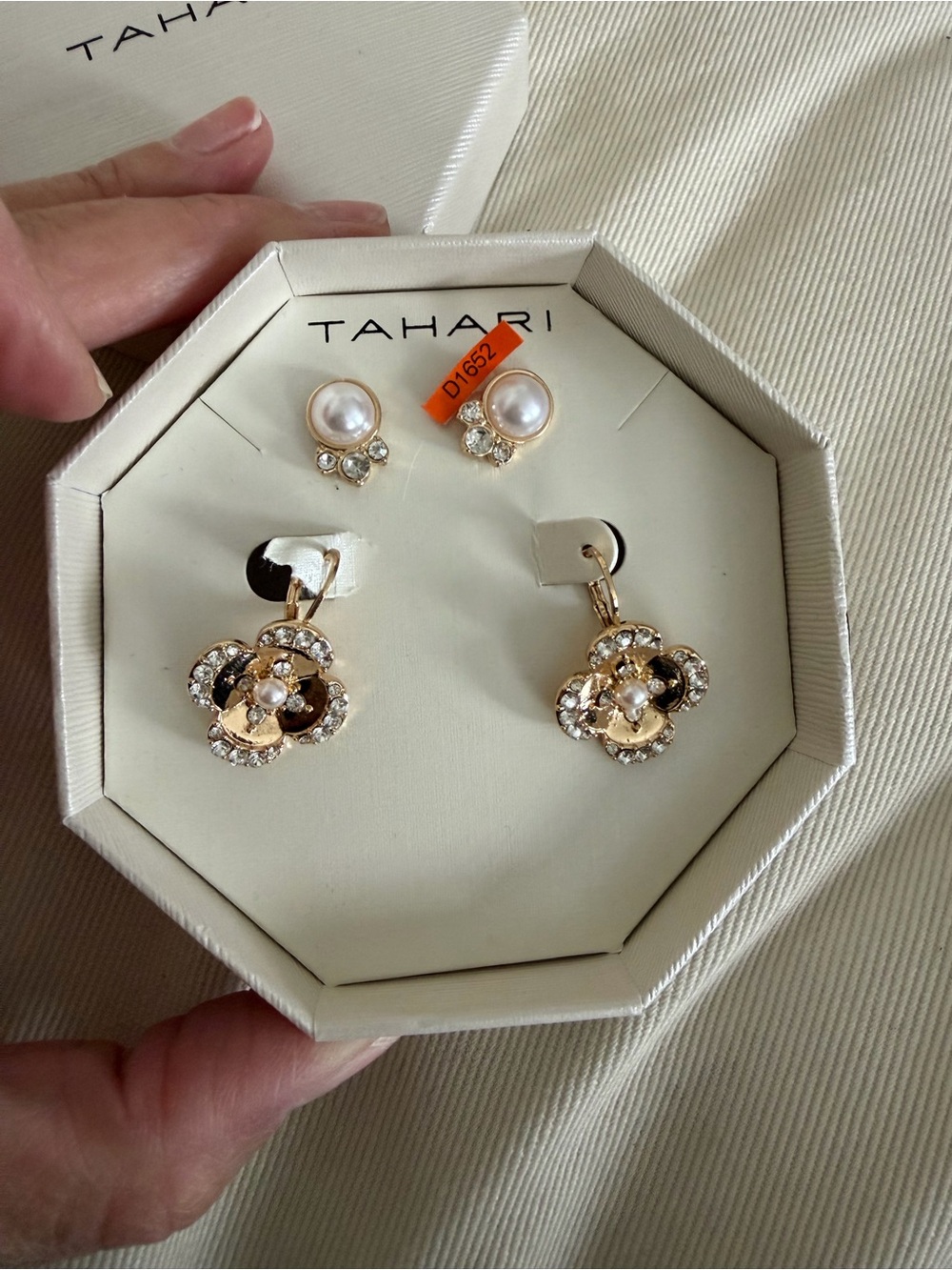 Tahari jewelry set includes gold-toned earrings